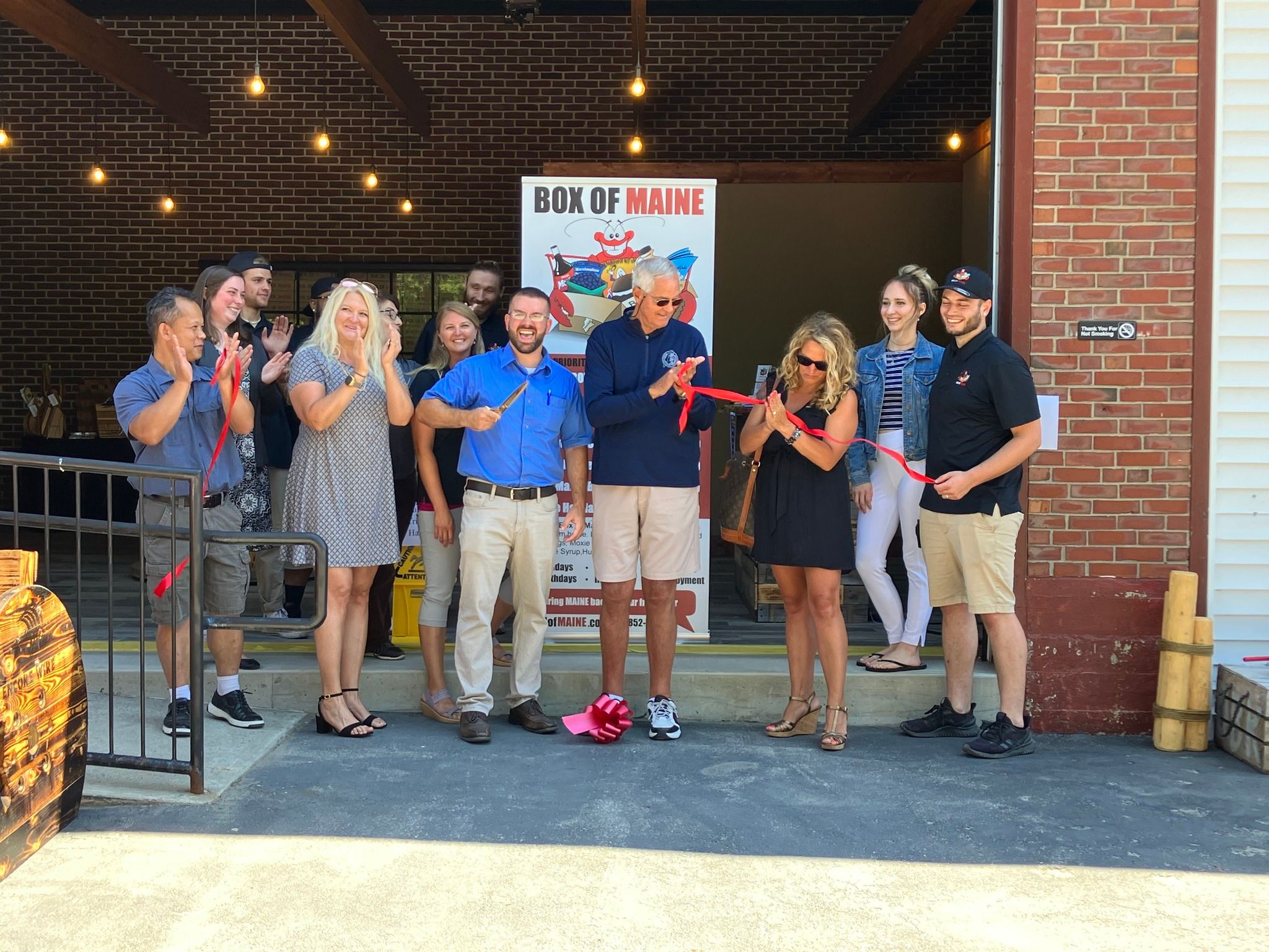 Daniel cuts ribbon on new location in Brewer Maine